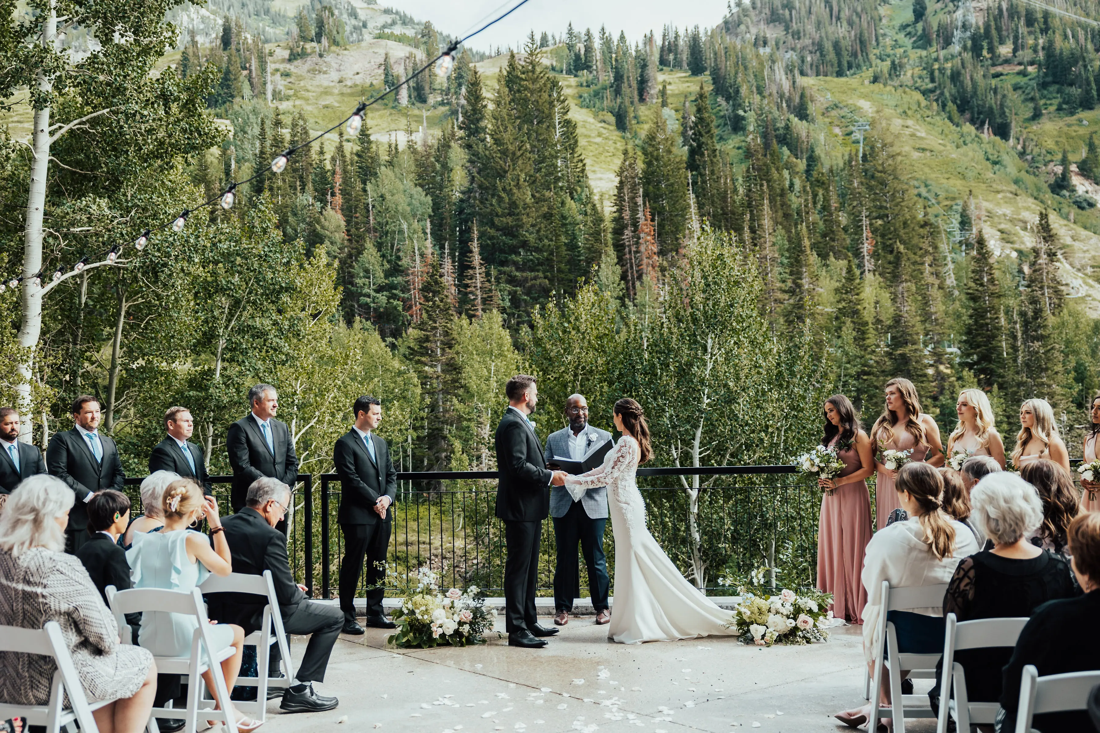 Bride Wearing Long Sleeve Mermaid Wedding Dress with Groom Outdoors in Mountains