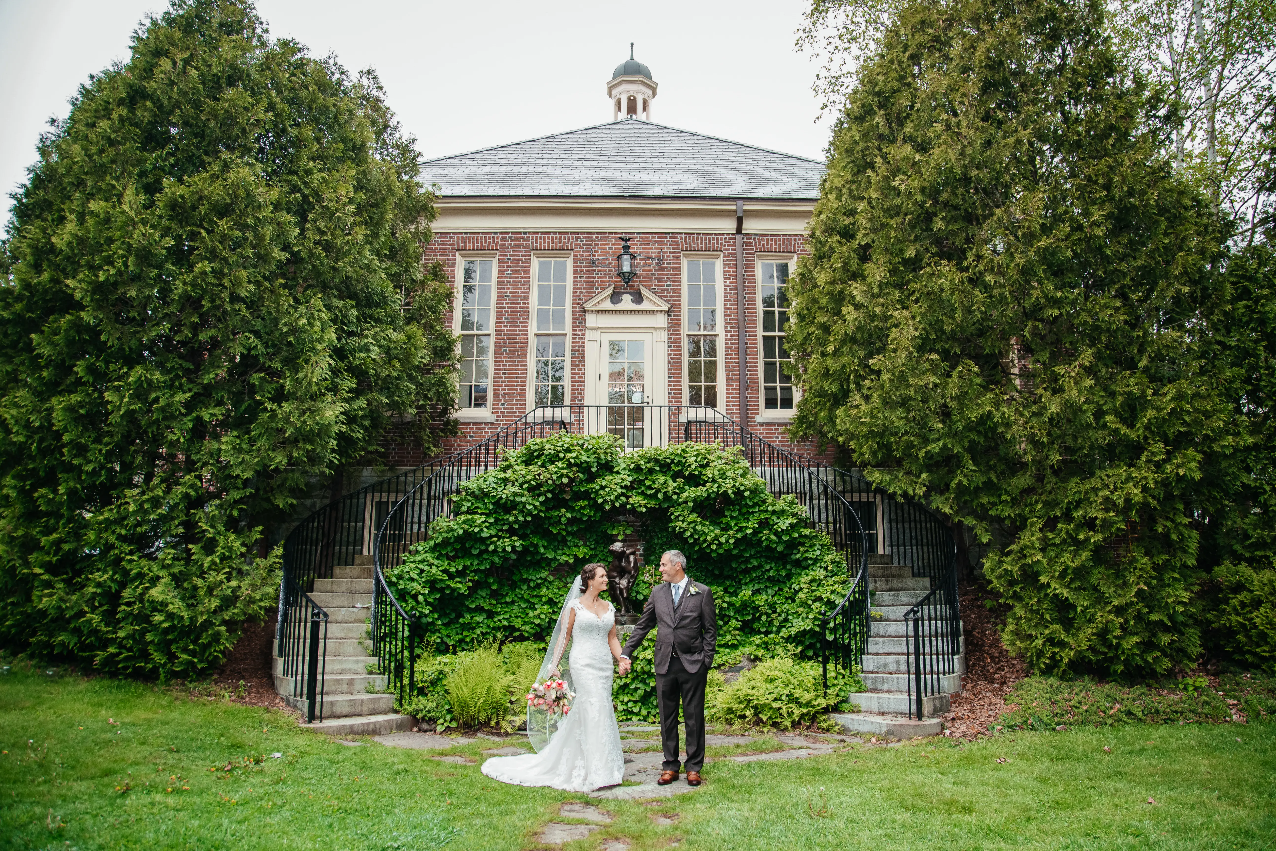 Groom With Bride Wearing Lace Fit-And-Flare Daphne By Rebecca Ingram