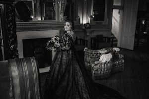 Bride In Long Sleeve Black Wedding Dress Called Zander By Sottero And Midgley