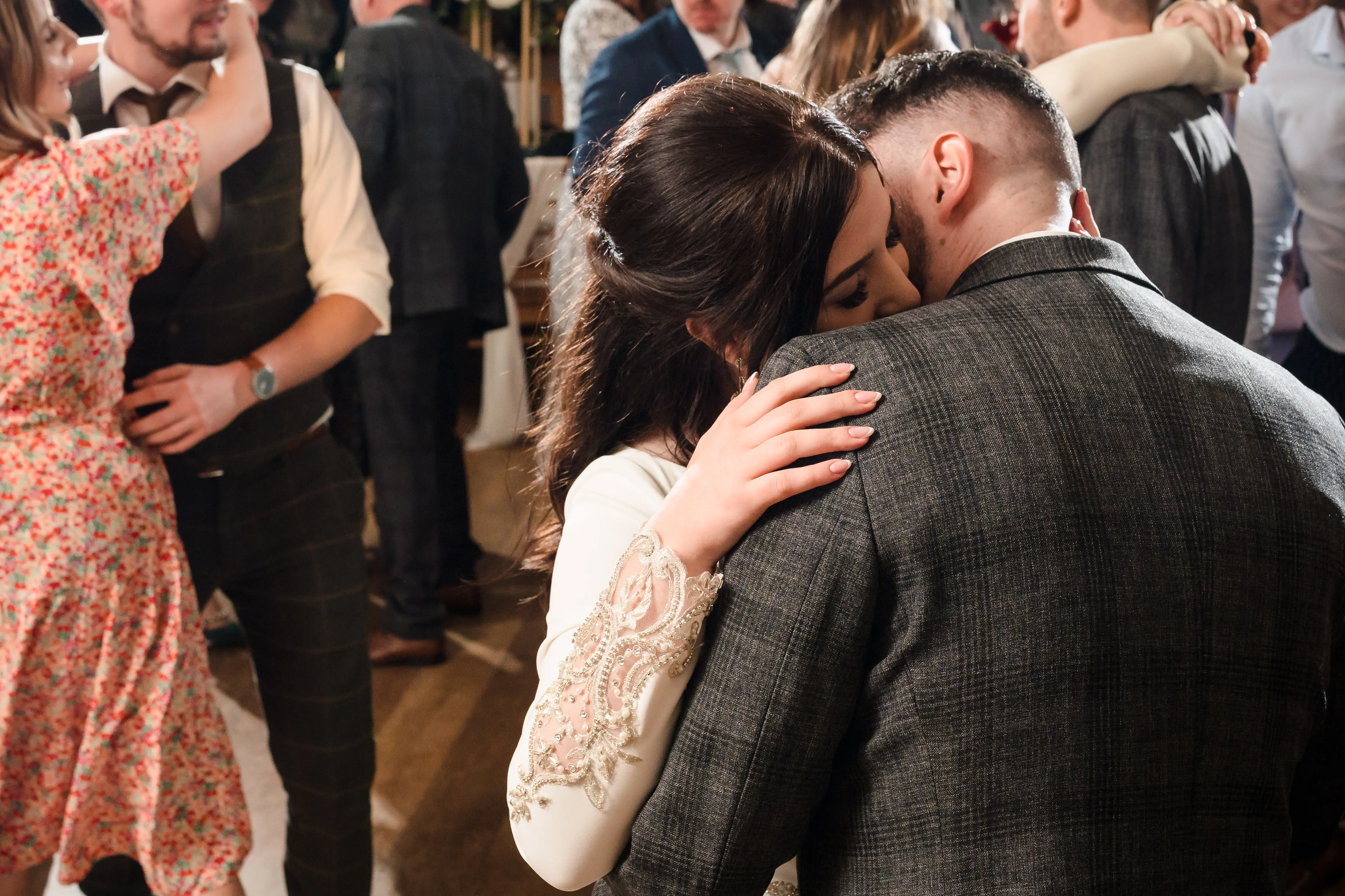 Bride Wearing Simple Keyhole Back Wedding Dress Called Aston By Sottero and Midgley Dancing With Groom
