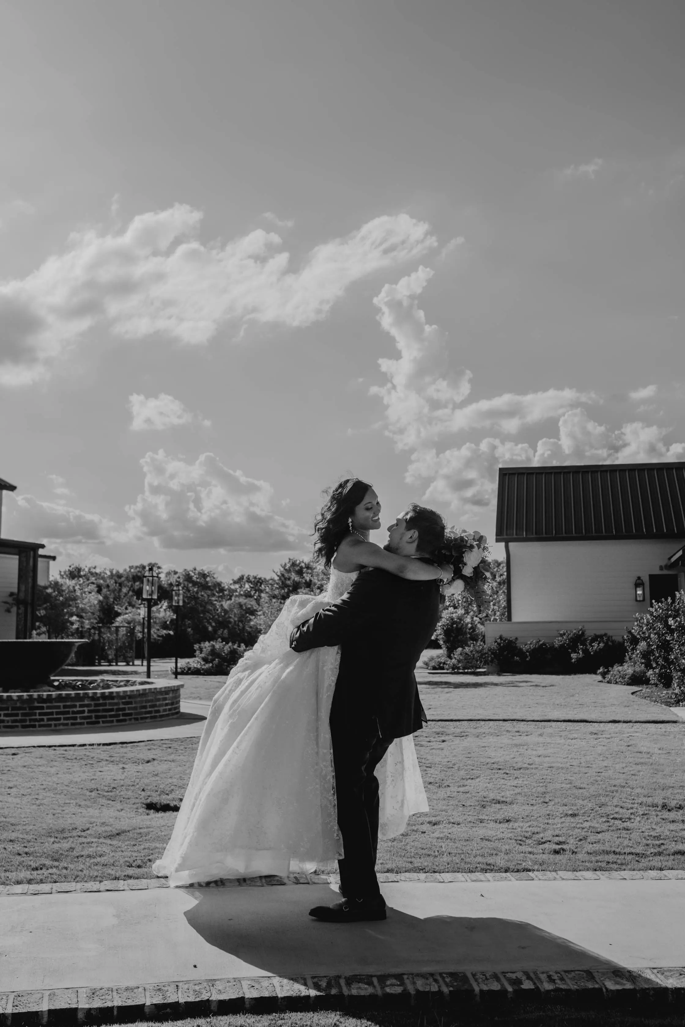 Bride Wearing Sparkly Ballgown Wedding Dress Called Zartasha By Sottero and Midgley With Groom