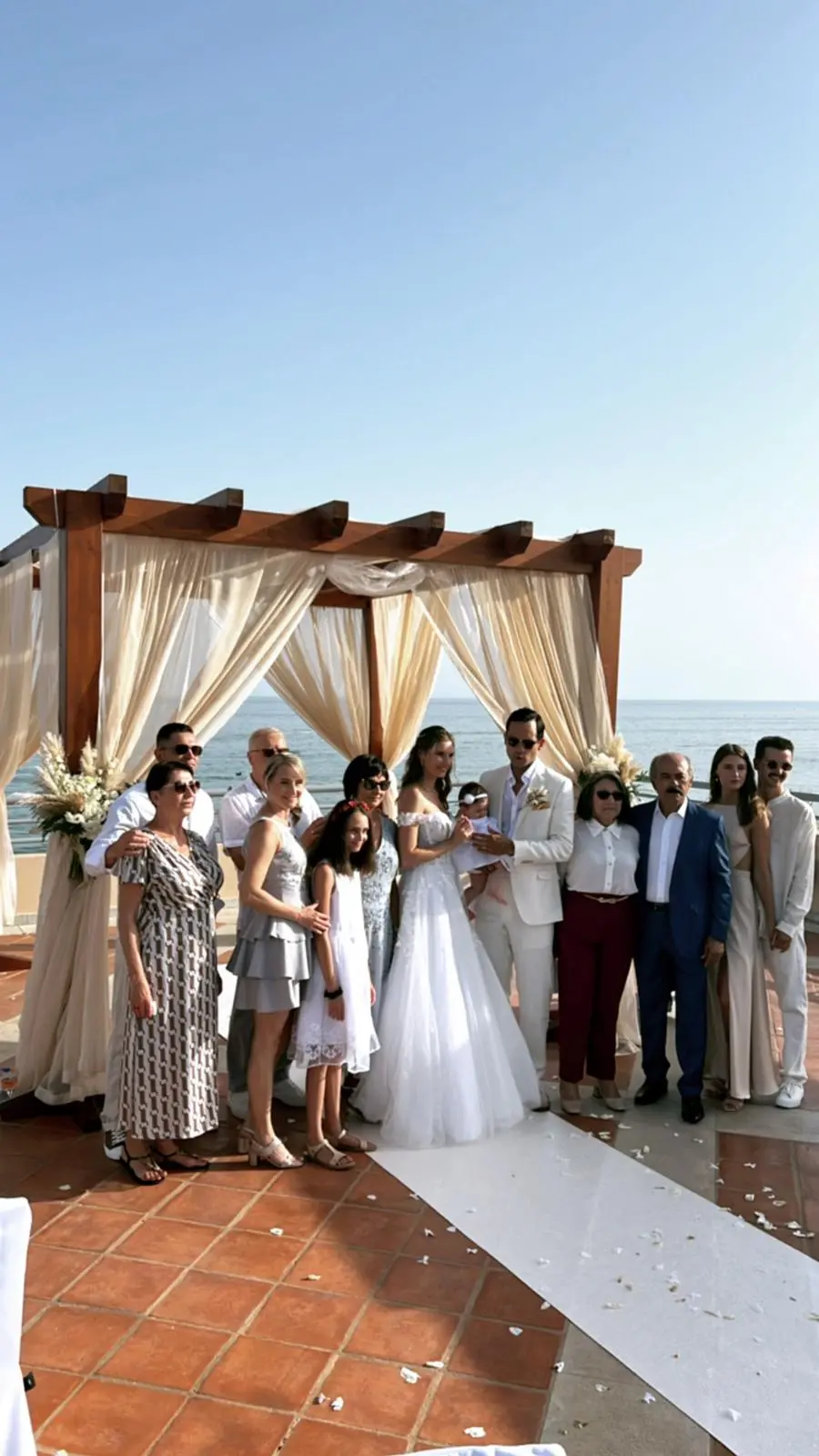Bride Posing With Family In Floral A Line Wedding Dress Named Harlem By Maggie Sottero