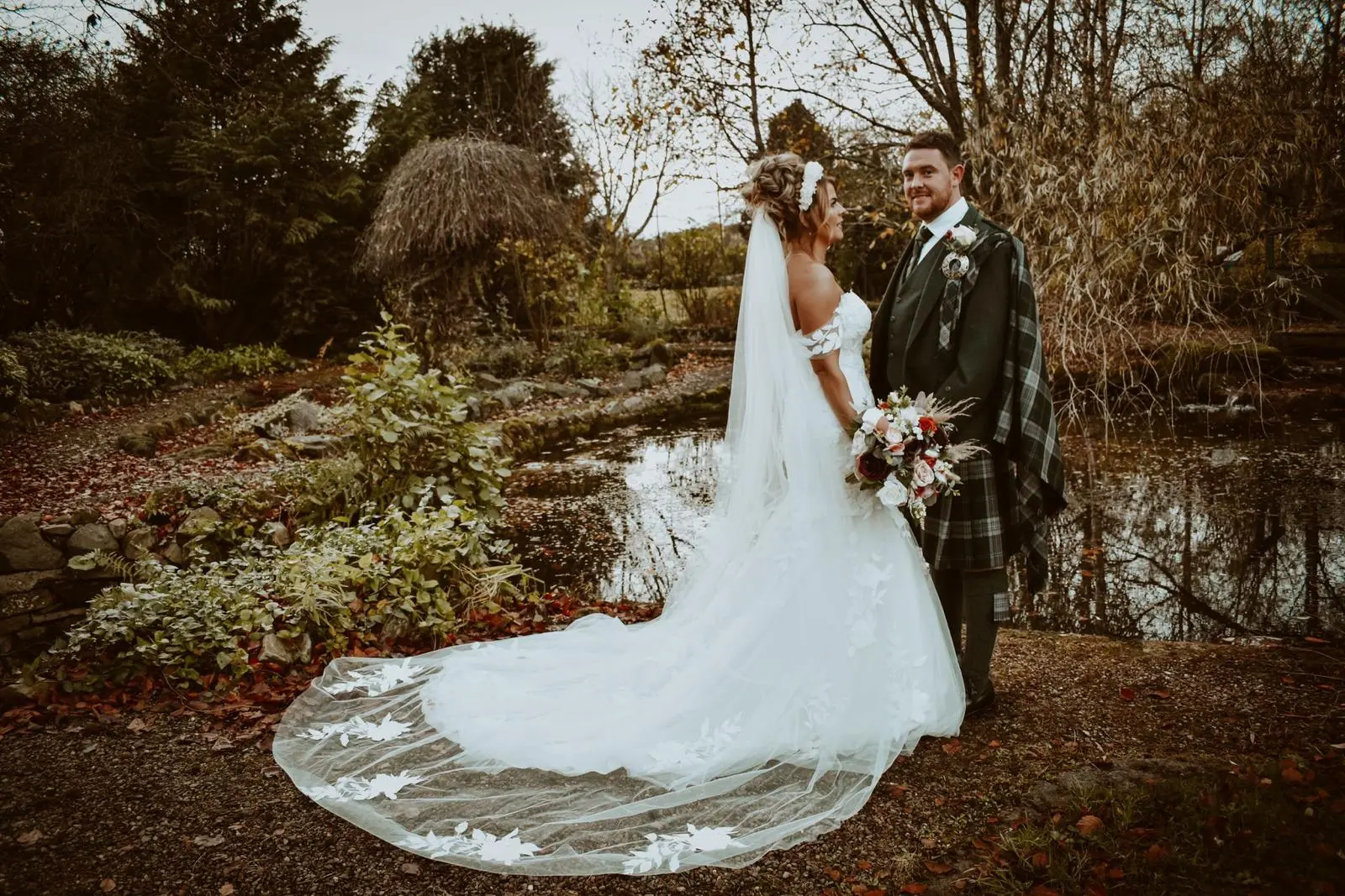Real Bride in Strapless Mermaid Bridal Gown with Oversize Lace Floral Motifs over Sparkle Tulle and Sweetheart Neckline Called Hattie by Rebecca Ingram