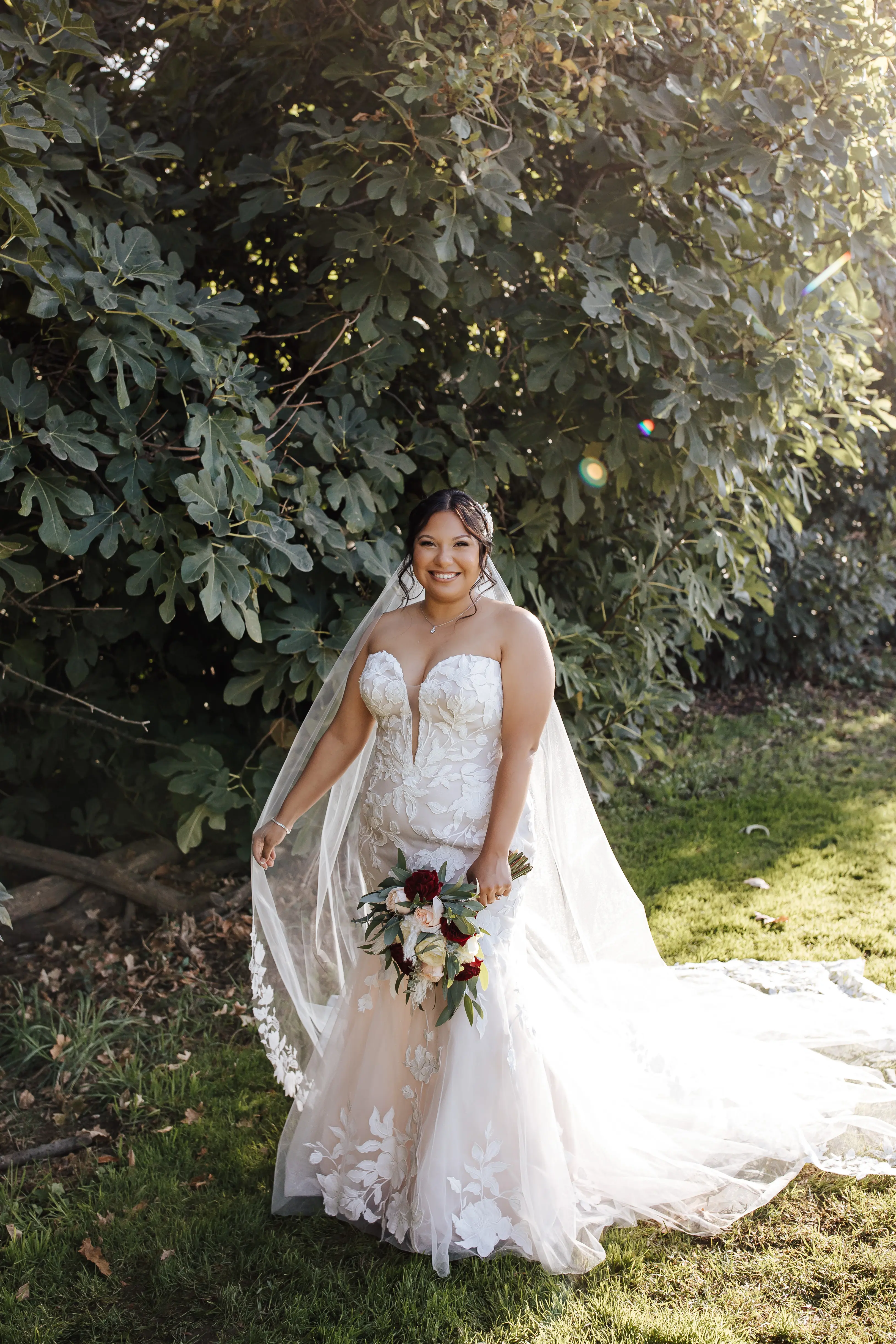 Real Bride in Strapless Mermaid Bridal Gown with Oversize Floral Lace Motifs Over Sparkle Tulle Called Hattie by Rebecca Ingram