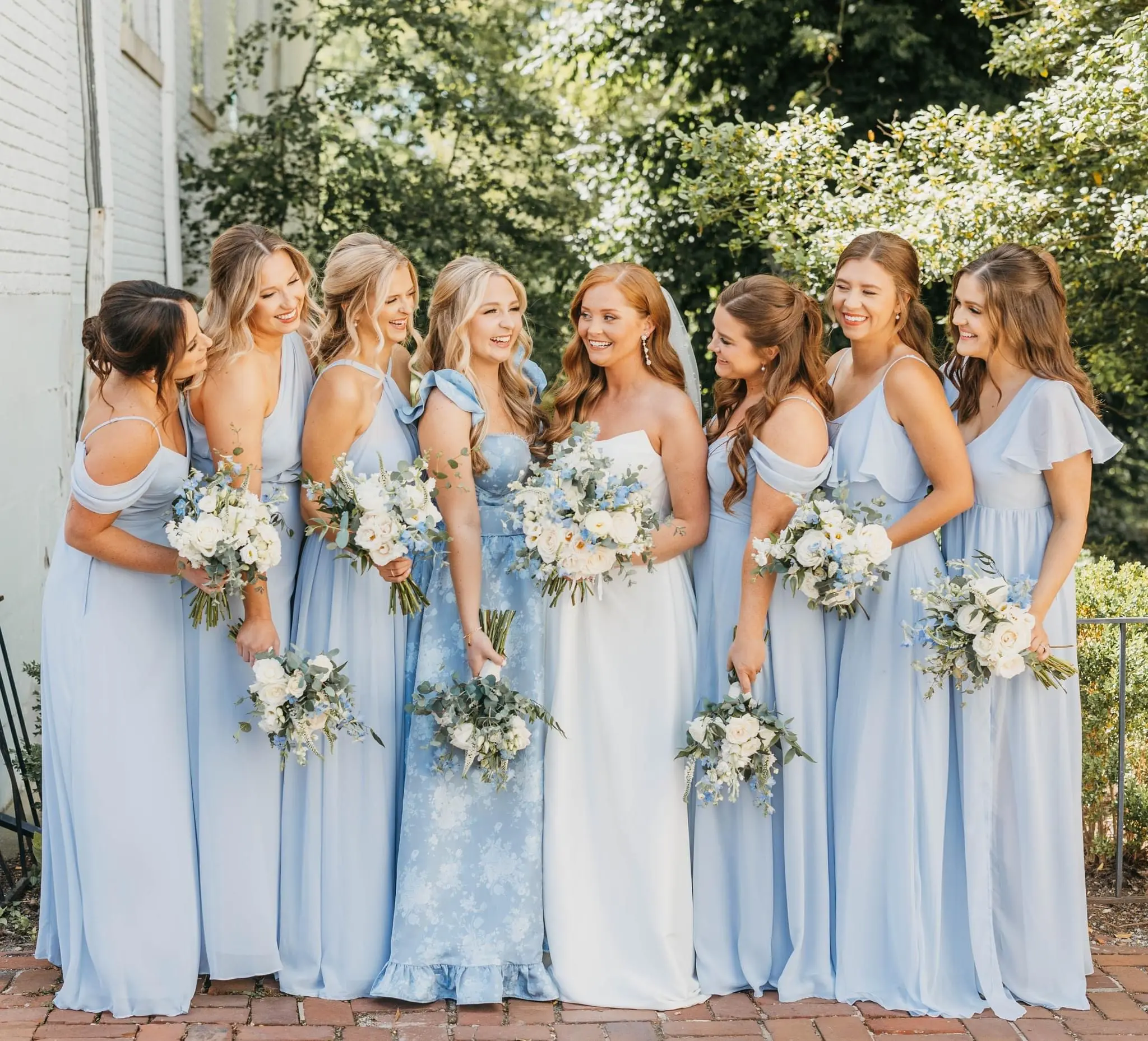 Bride wearing Aspen by Sottero and Midgley with her bridesmaids