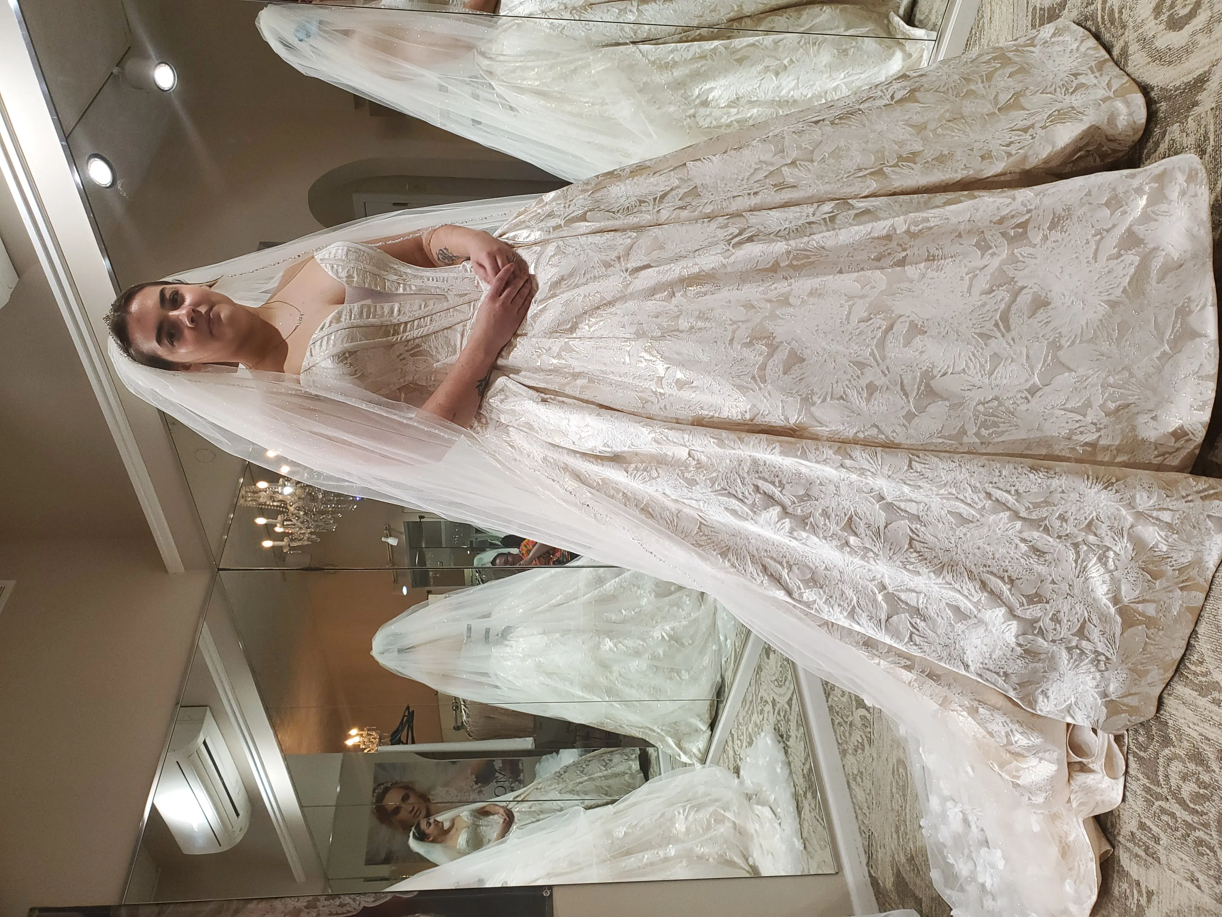 Bride wearing Derrick Marie by Maggie Sottero at her bridal appointment