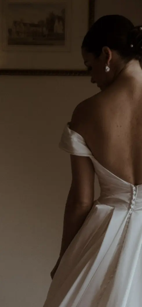 Bride wearing Scarlet wedding dress by Maggie Sottero