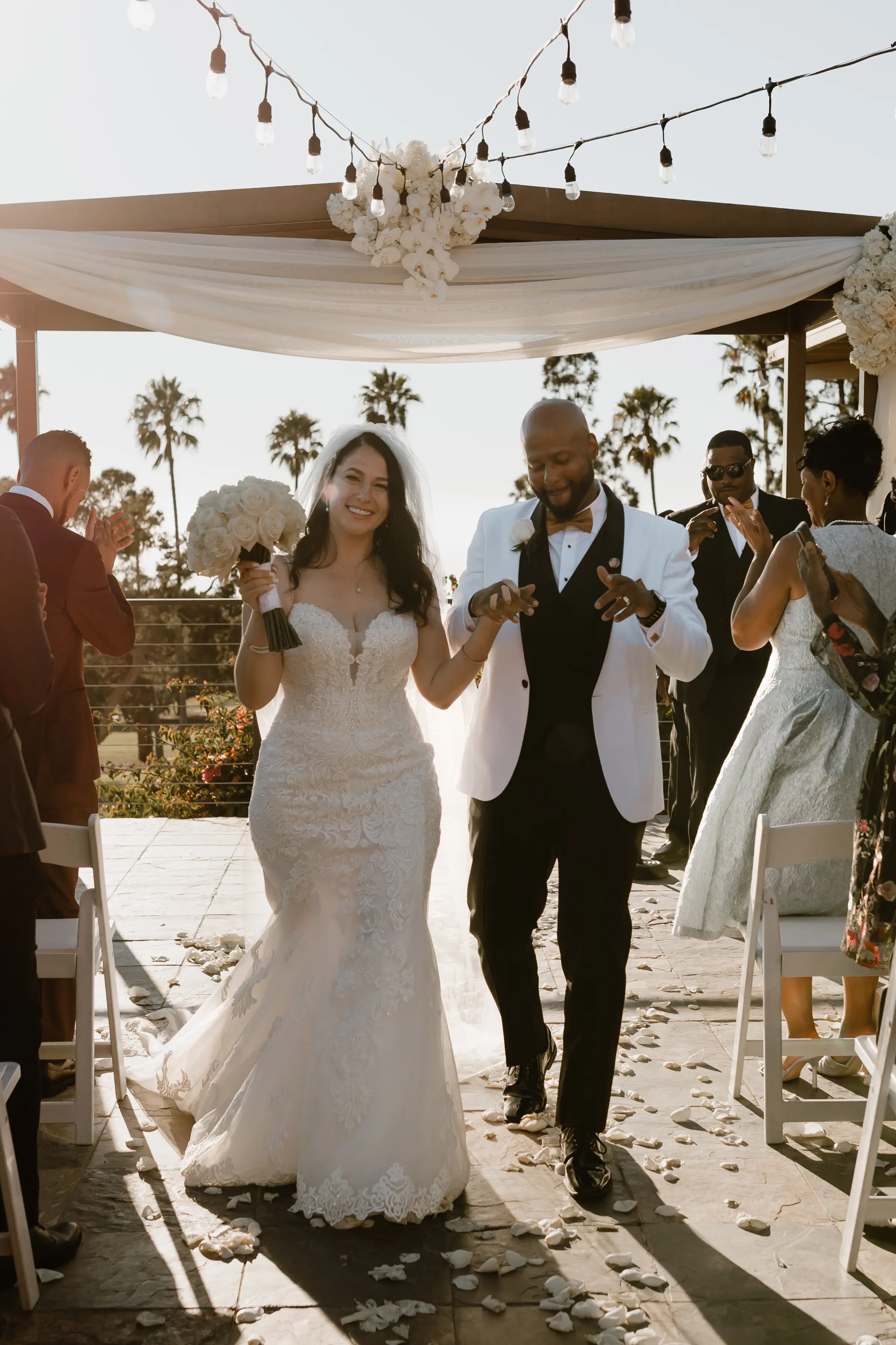 Bride Wearing Lace Wedding Dress Called Fiona By Maggie Sottero At Tropical Venue With Groom In White Suit