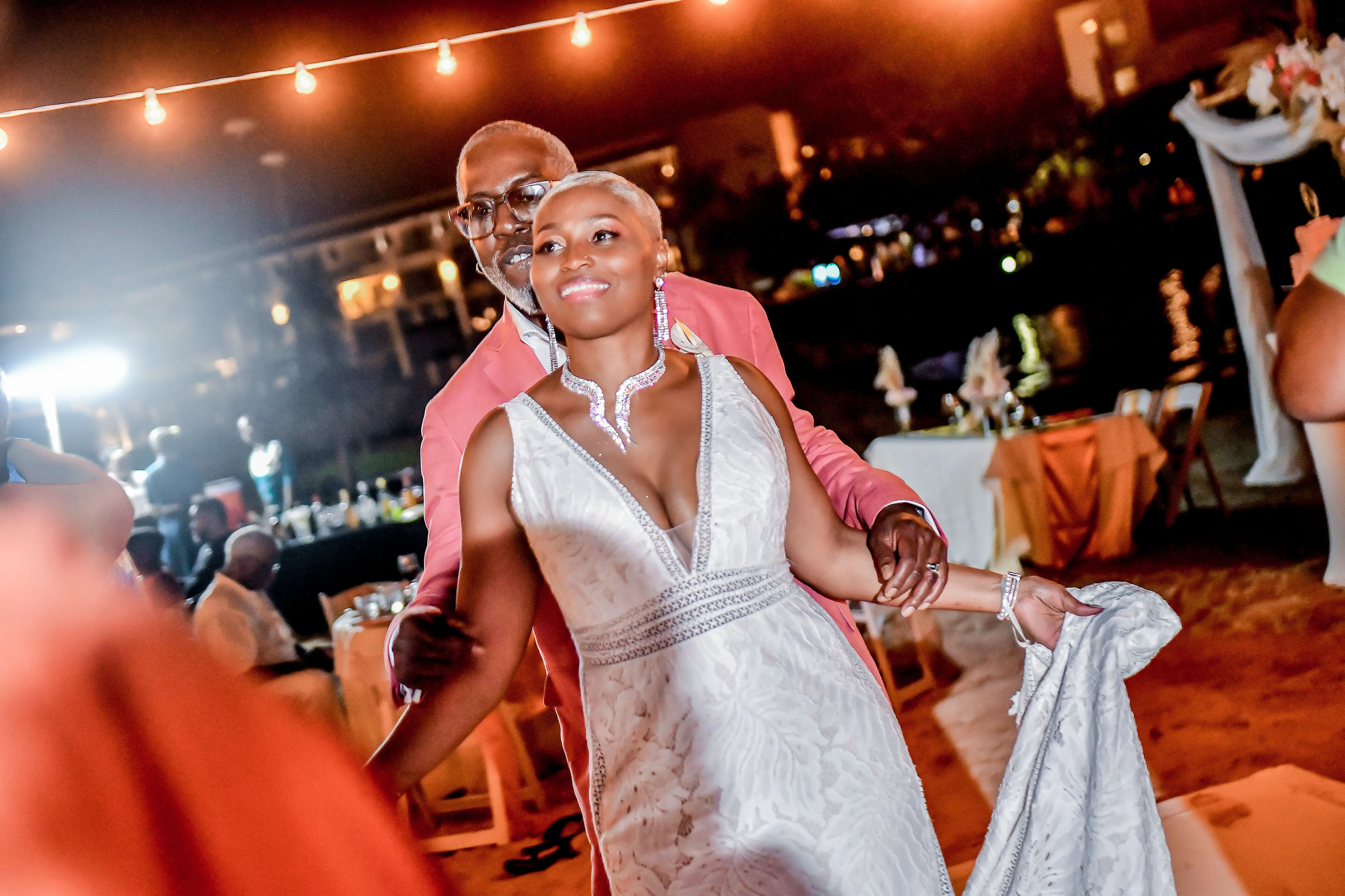 Bride In Boho Lace Wedding Dress Called Burke By Maggie Sottero With Groom In Pink