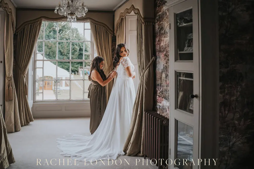Bride In Textured A-line Lorraine Rebecca Ingram With Bridesmaid