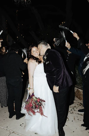 Groom Kissing Bride Wearing A-line Bridal Dress Ainsleigh By Rebecca Ingram