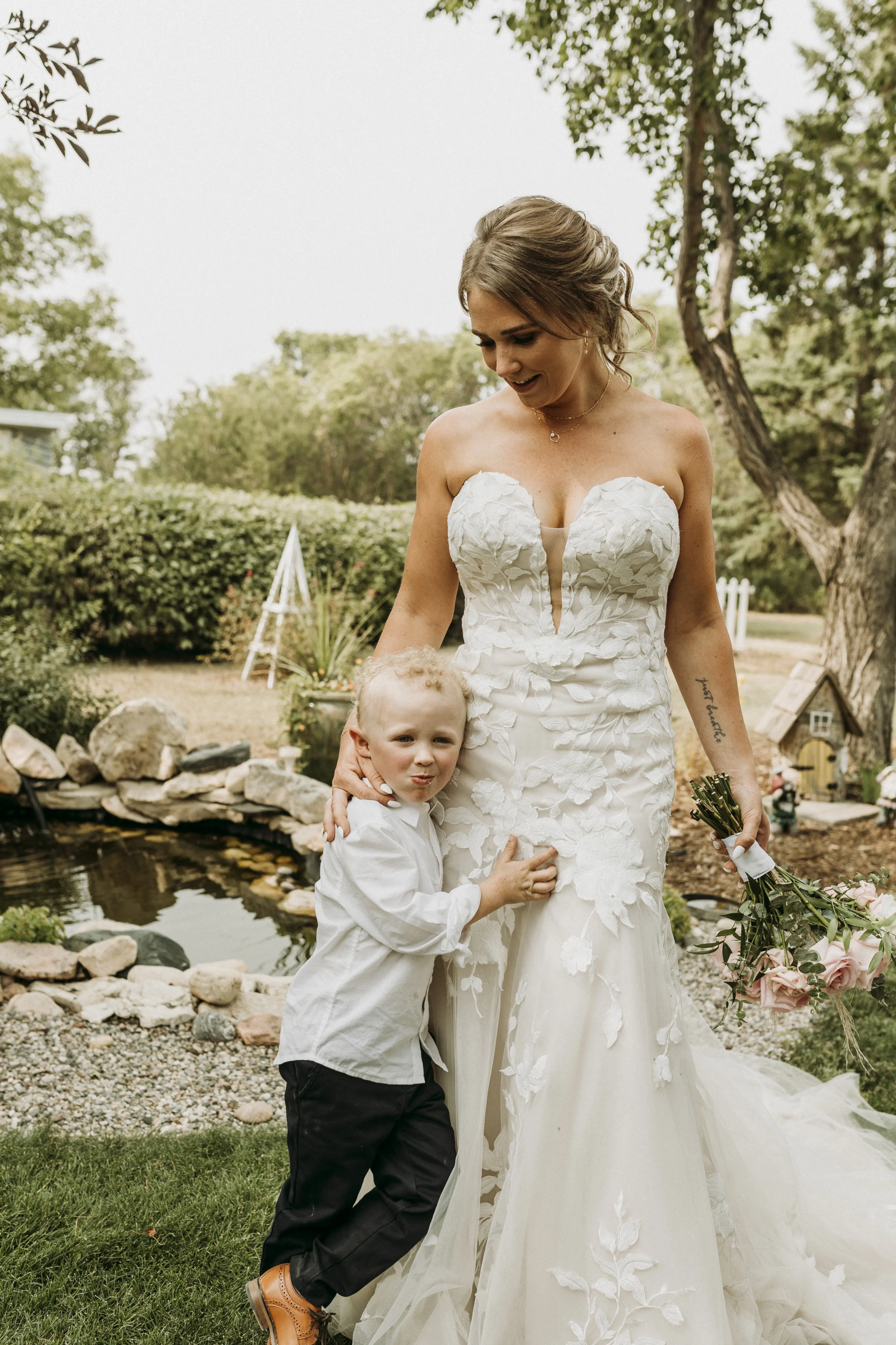 Bride wearing strapless mermaid wedding dress