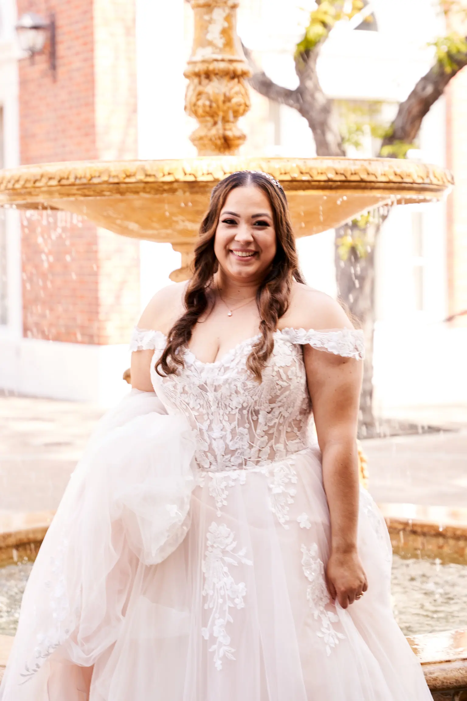 Bride Wearing Lace Ballgown Wedding Dress Called Harlem By Maggie Sottero Near A Fountain