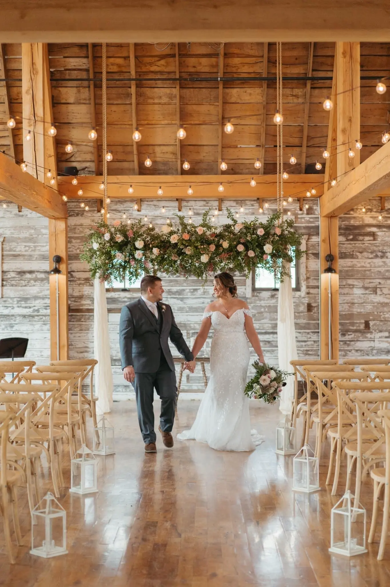 Bride Wearing Lace Beaded Wedding Dress Called Charmaine By Maggie Sottero And Groom Holding Hands