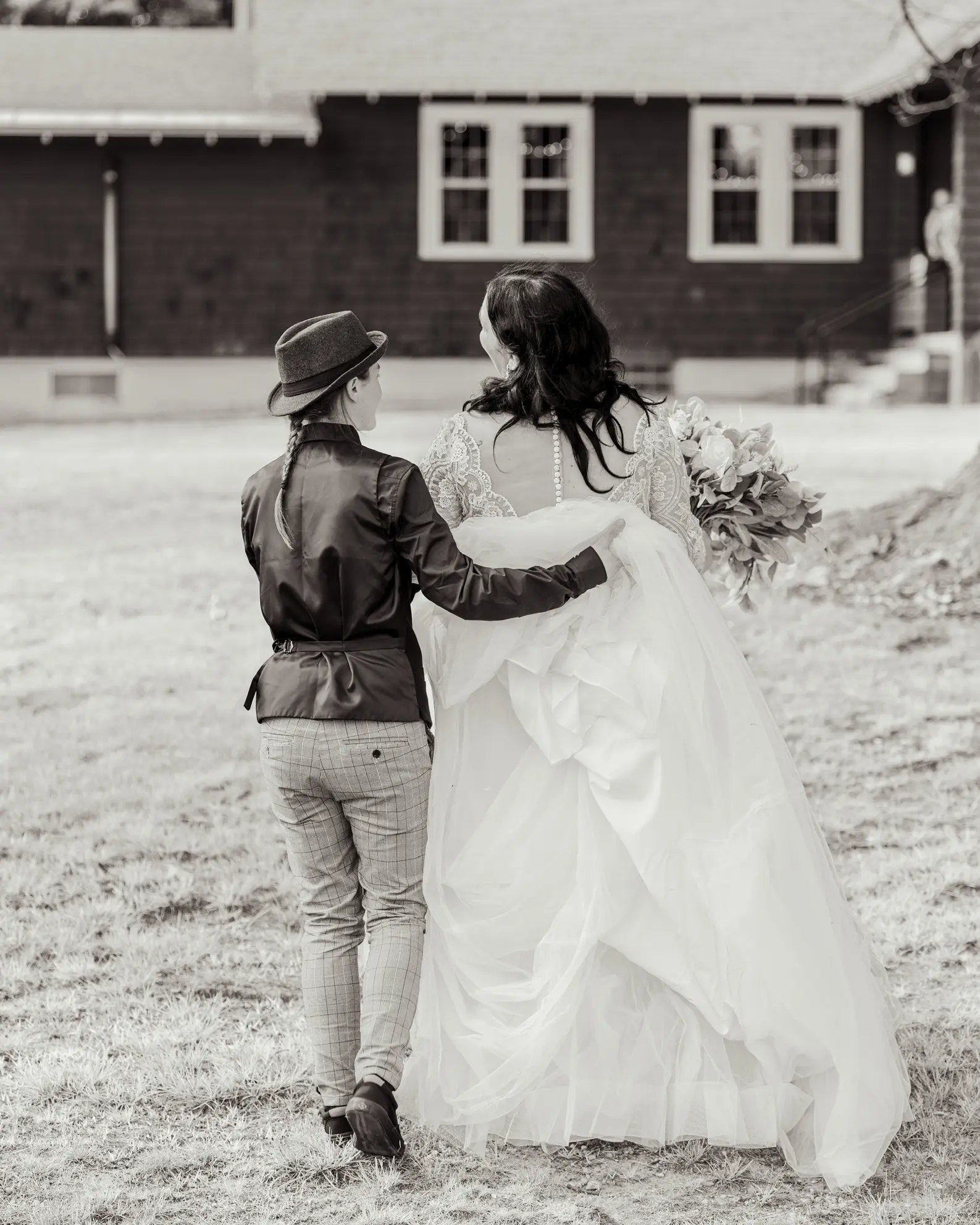 Real Bride in V-neckline, Tulle Skirt Wedding Dress Named Mallory Dawn by Maggie Sottero with Groom