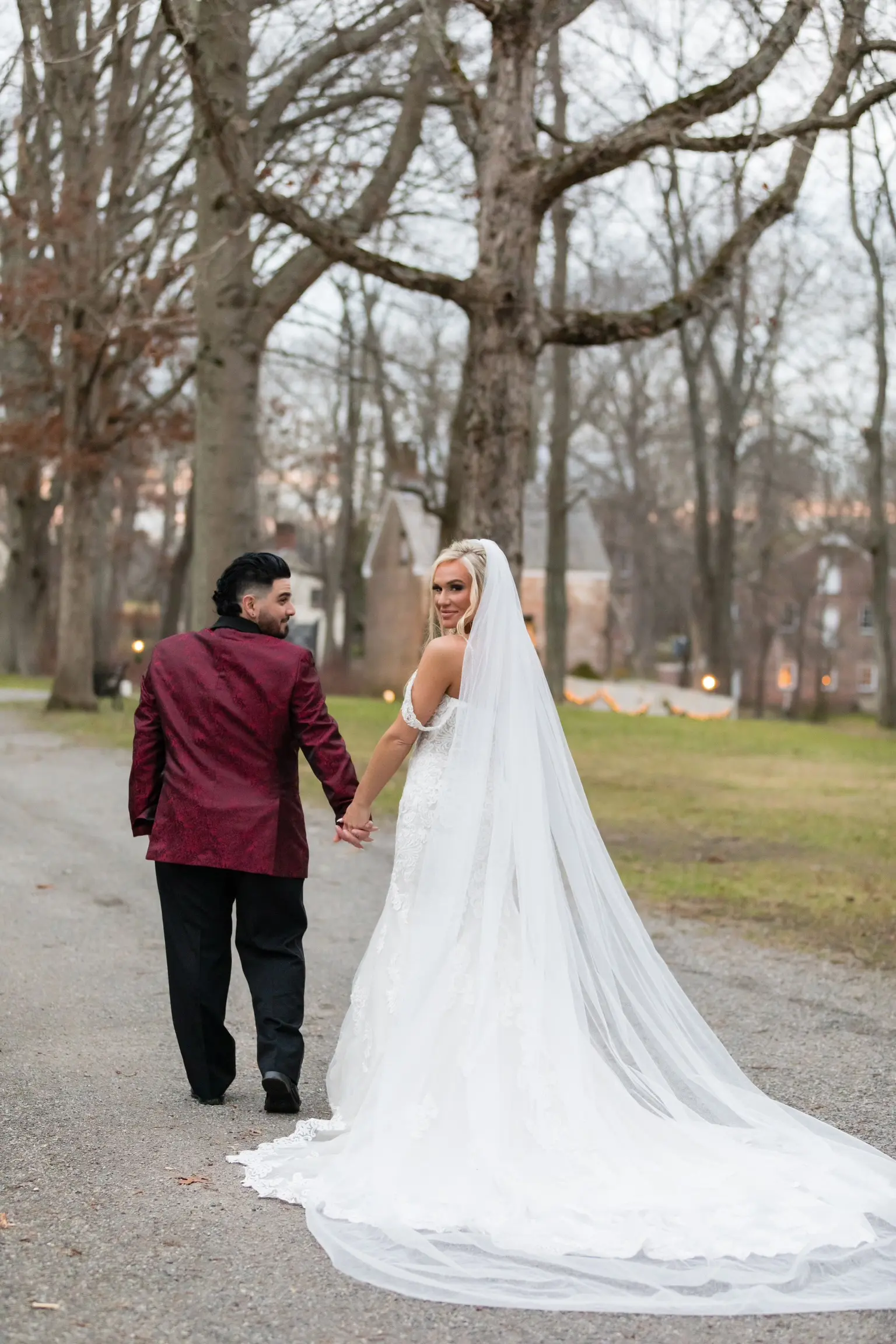 Bride In Lace Off The Shoulder Wedding Dresses Called Fiona By Maggie Sottero With Groom