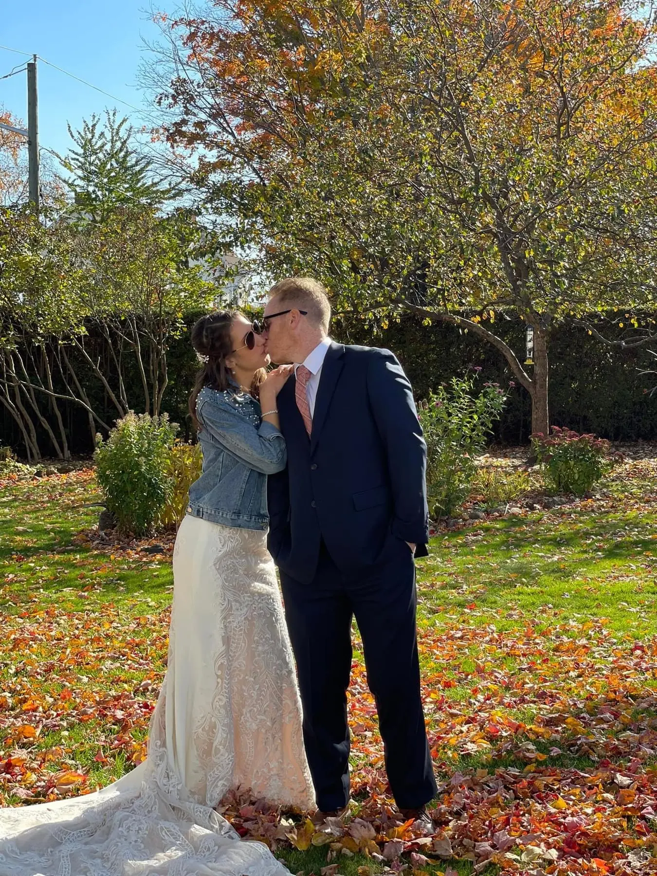 Real Bride in Halter Fit-and-Flare Crepe Wedding Dress with Layers of Sheer Lace and Lace Motifs Called Kevyn by Sottero & Midgley