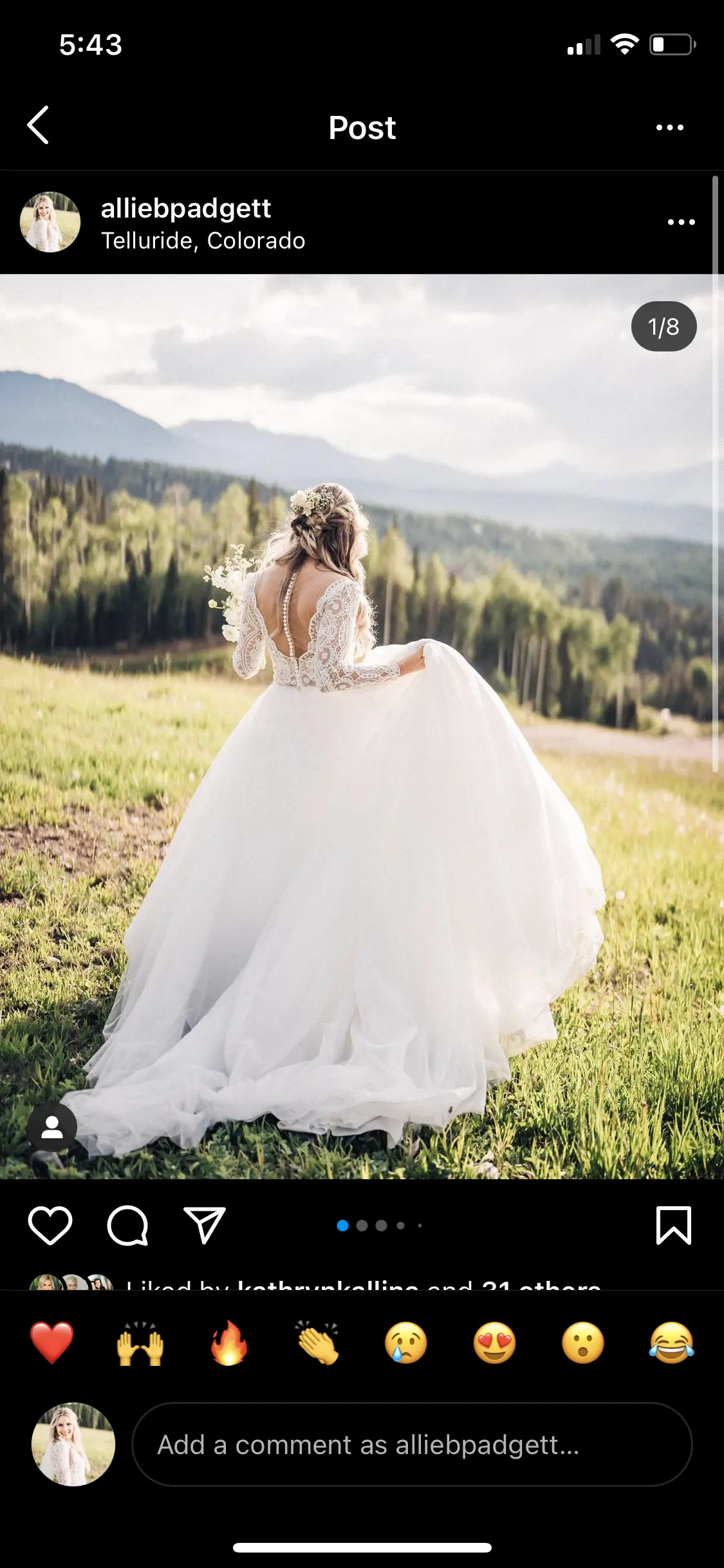 Bride wearing long sleeve lace ballgown wedding dress