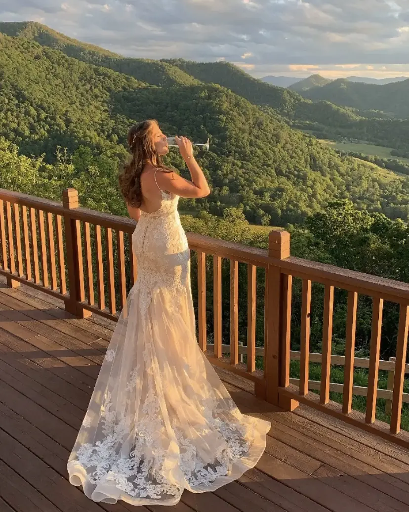 Bride Wearing Sheath Lace Wedding Dress Called Glorietta By Maggie Sottero
