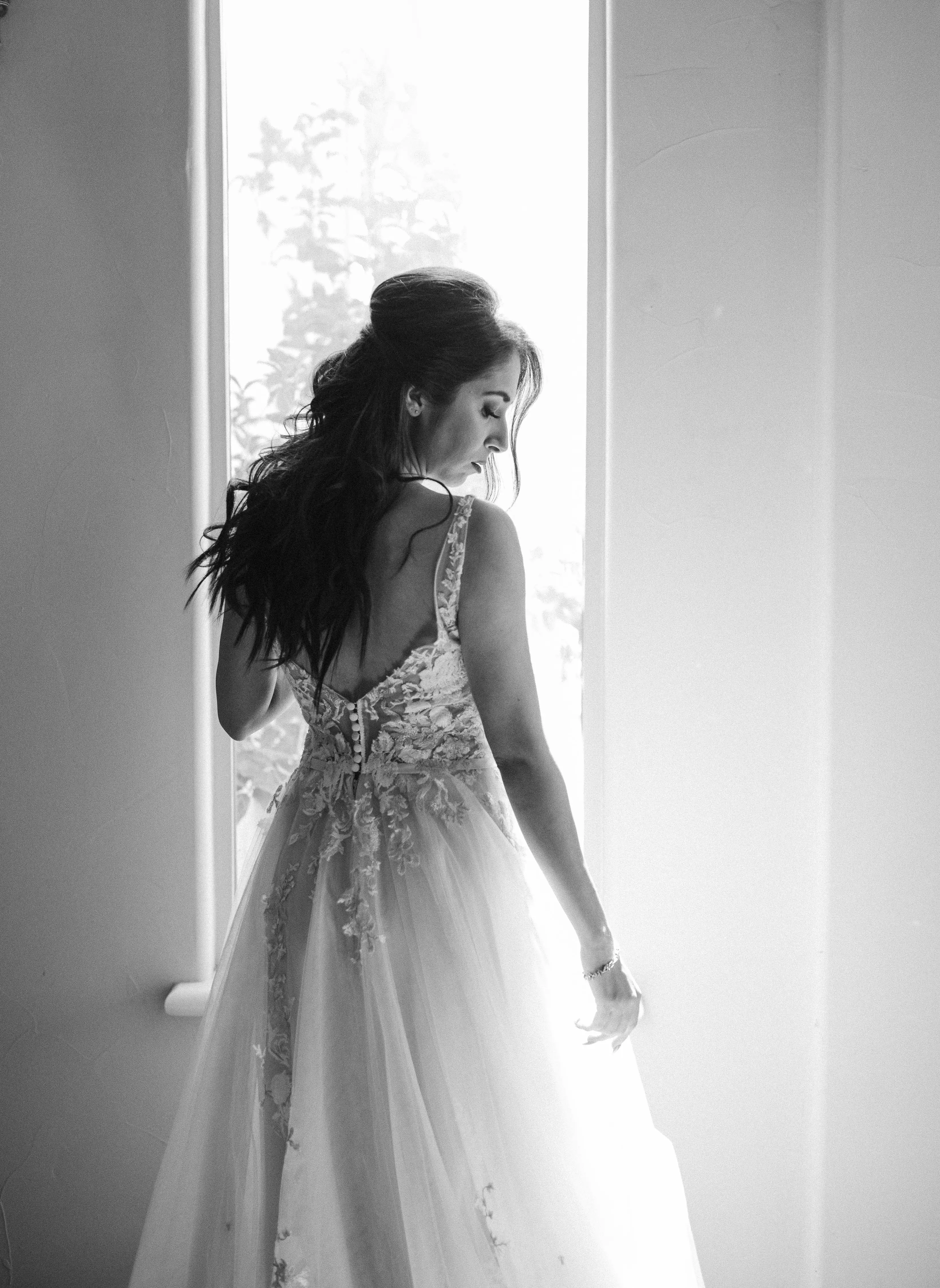 Bride in Magical A-Line Wedding Dress with Textured Illusion Motifs Called Minerva by Rebecca Ingram