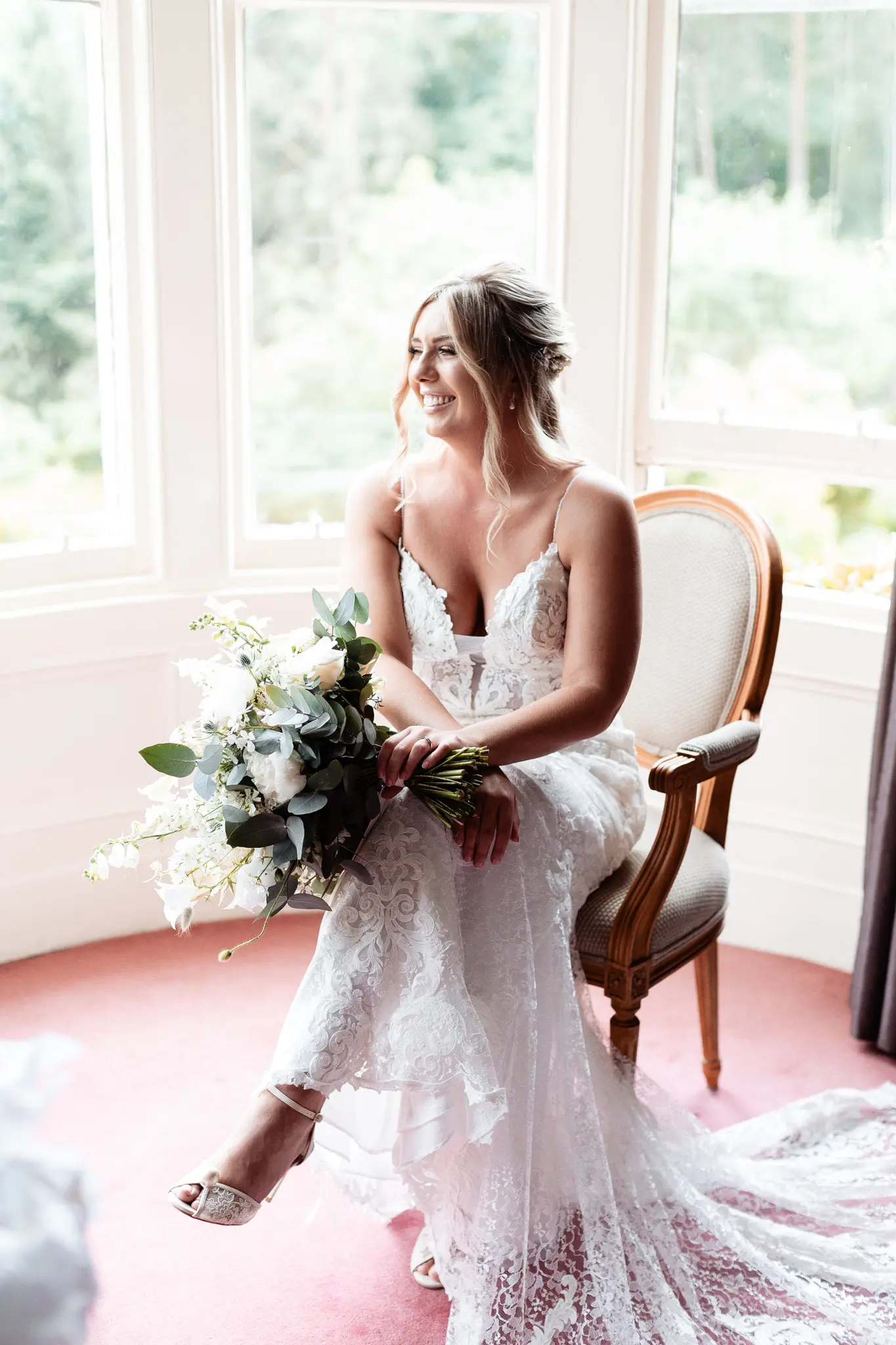 Bride in Romantic Lace Sheath Wedding Gown with Shimmering Lace Motifs Called Tuscany Lynette by Maggie Sottero