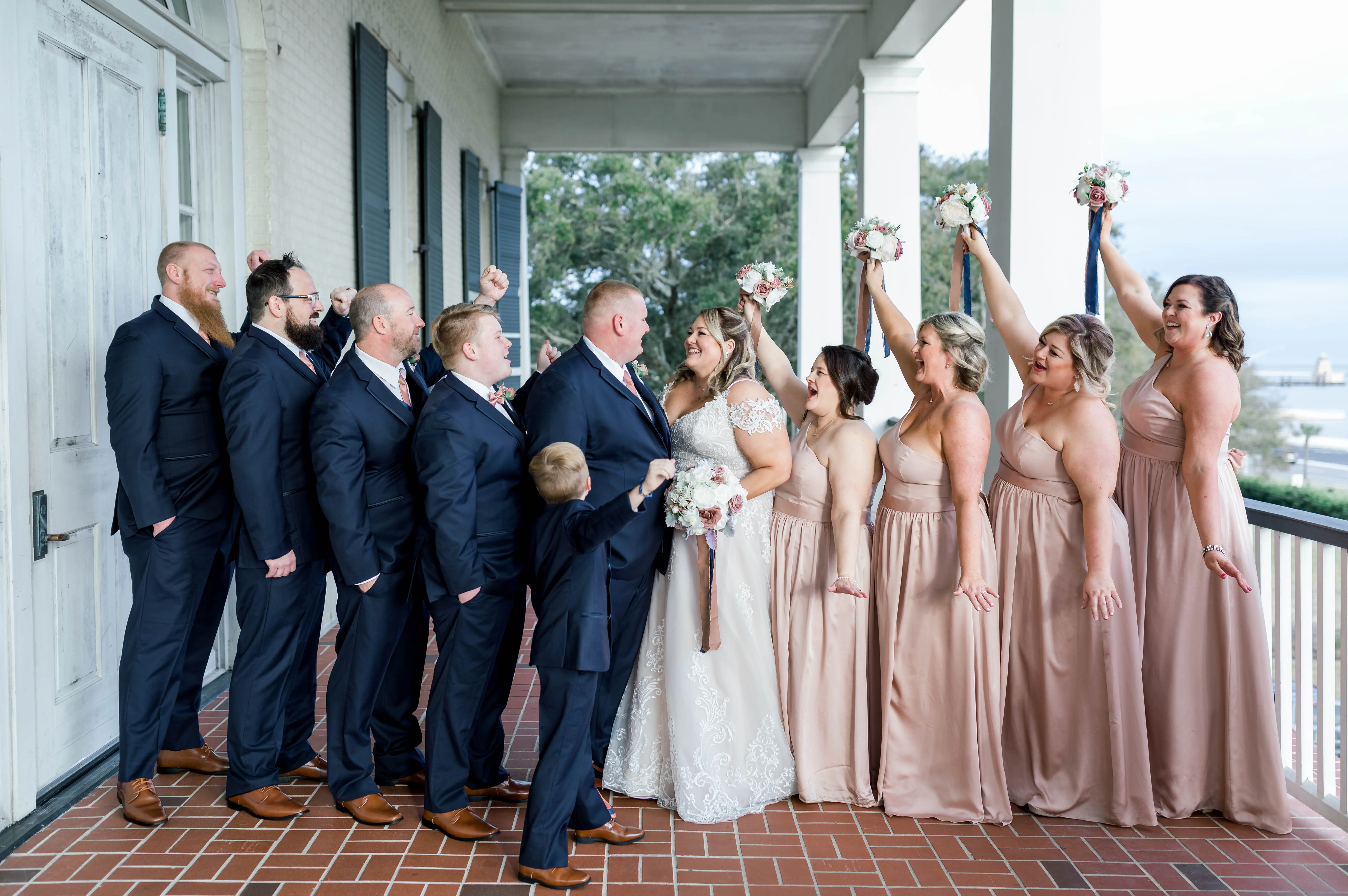 Wedding Party with Bride Wearing A-Line Wedding Dress Called Wallis by Maggie Sottero