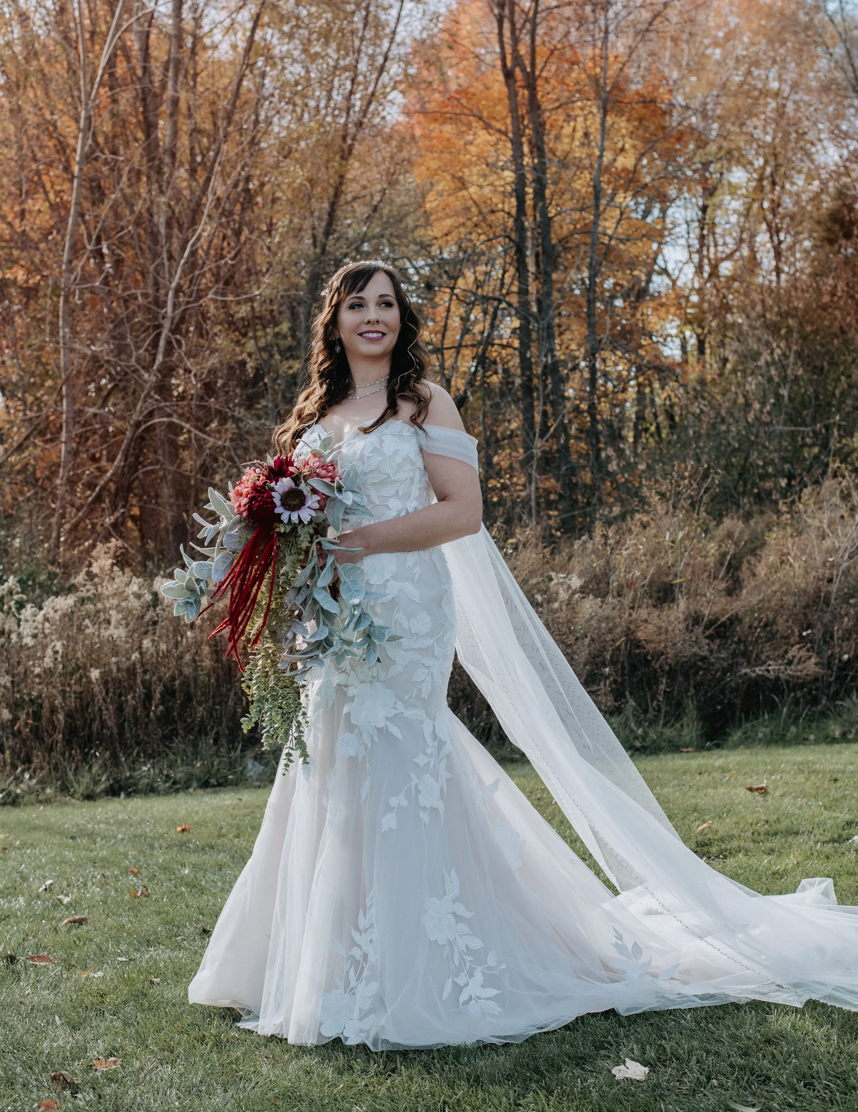 Bride wearing Mermaid Lace wedding dress called Hattie by Rebecca Ingram