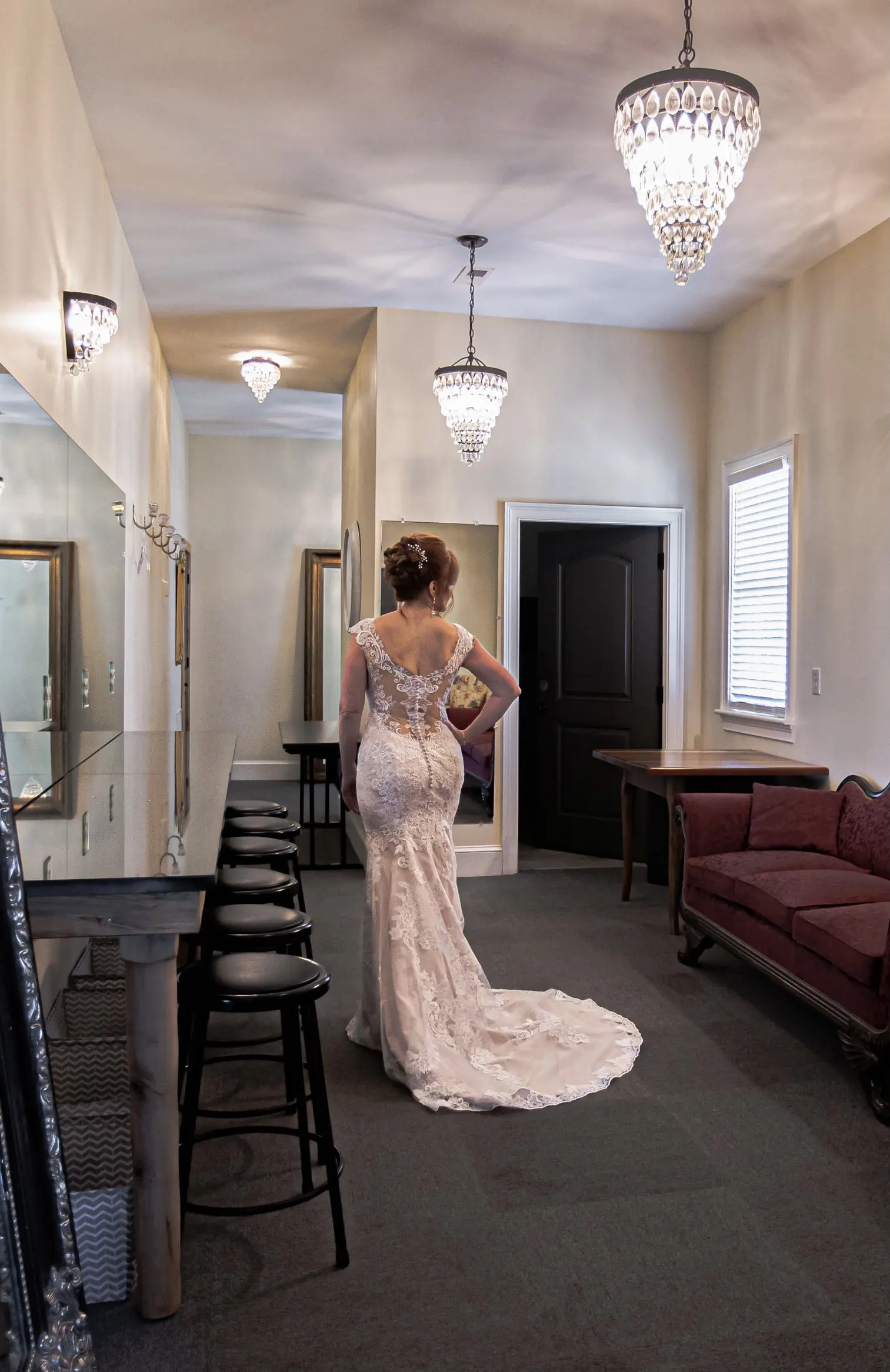 Bride Getting Ready Wearing a Lace Bridal Dress Called Daphne Lynette by Rebecca Ingram