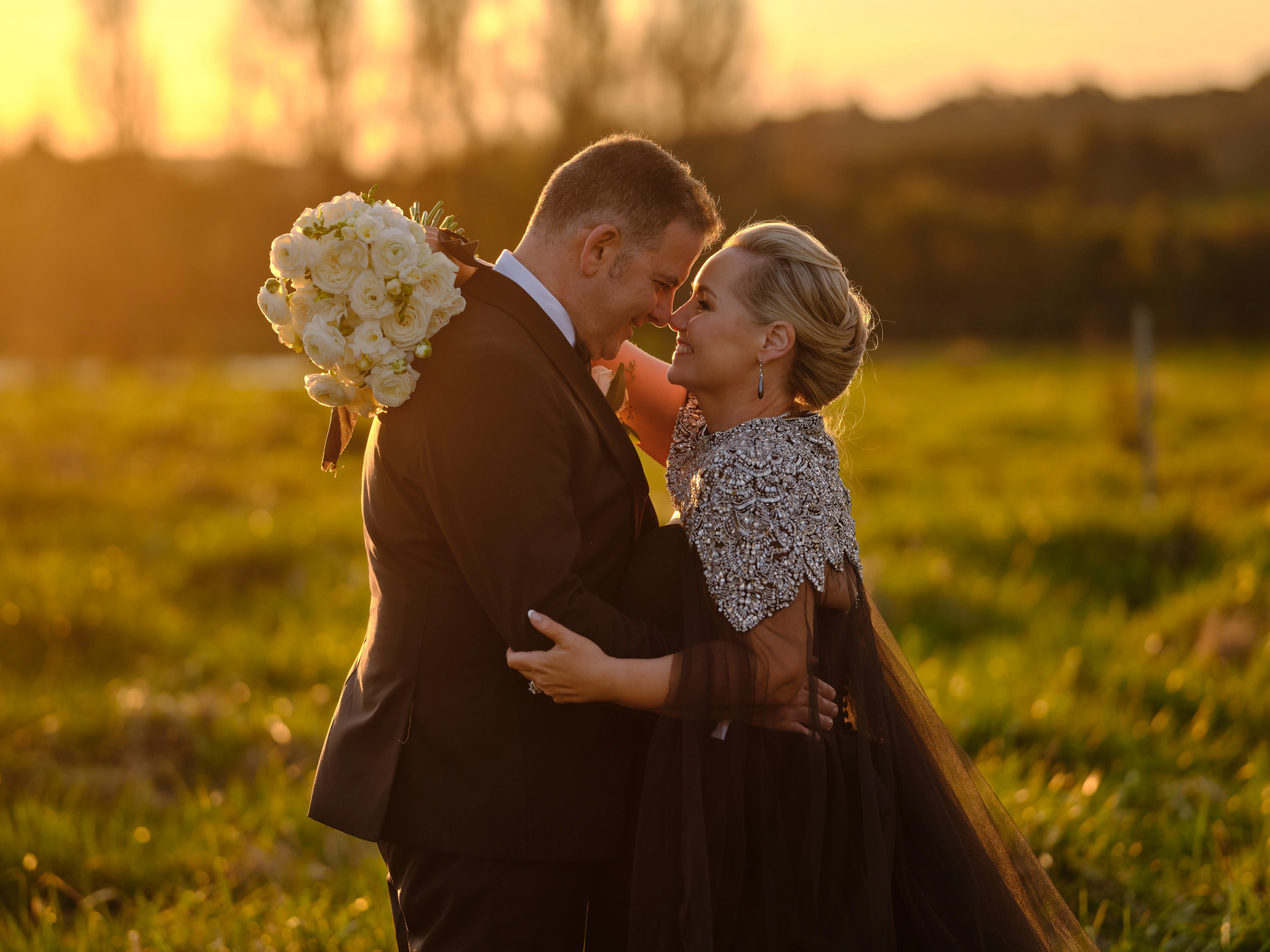 Bride wearing Aspen by Sottero and Midgley hugging her husband