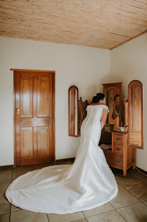 Bride Wearing Vintage Off The Shoulder Fit-And-Flare Wedding Dress Josie By Rebecca Ingram