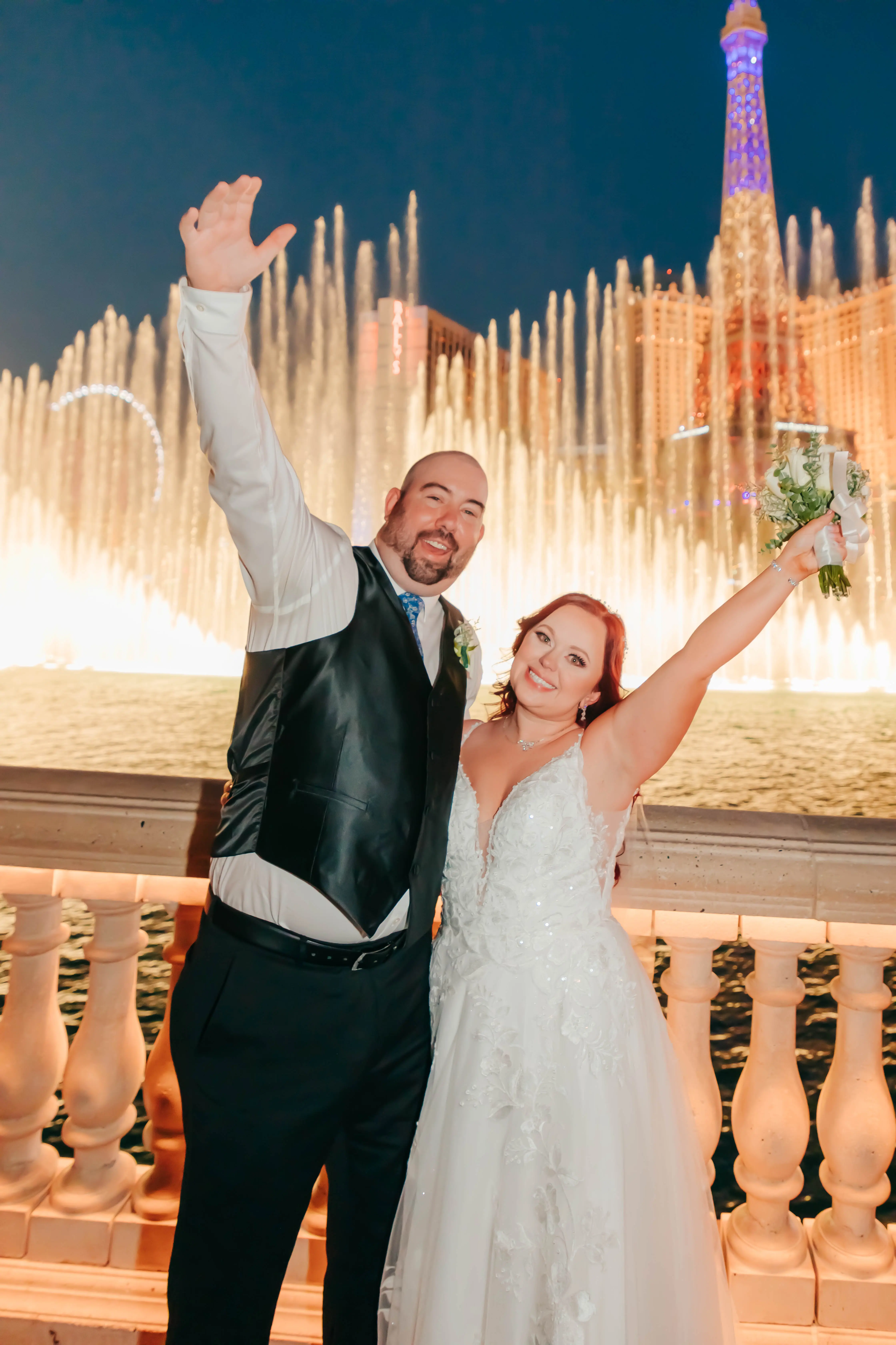 Groom and Bride at a Las Vegas Wedding Wearing Lace Ballgown Called Ellen by Rebecca Ingram