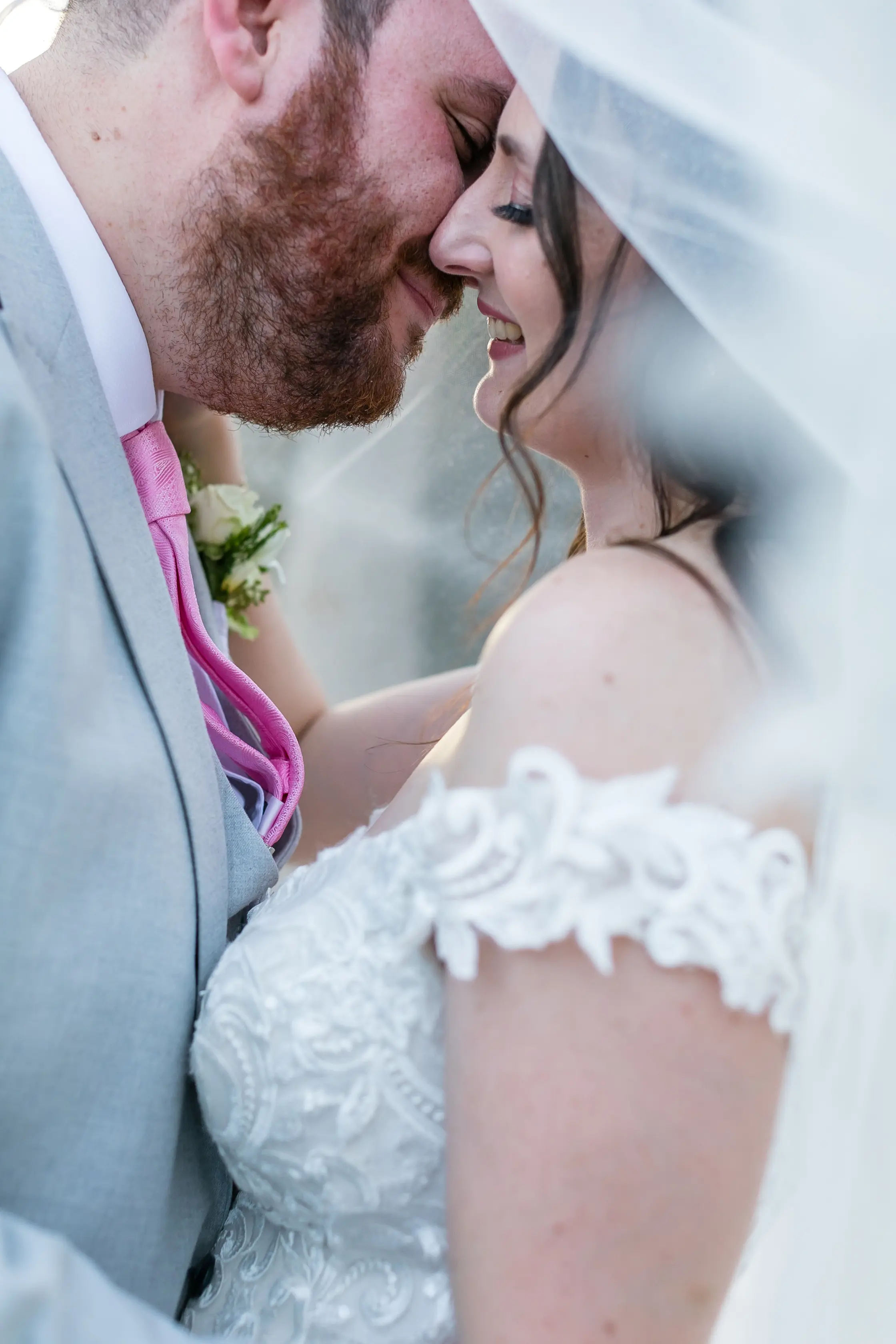 Bride In Off The Shoulder Lace Wedding Dress Called Edison By Maggie Sottero With Groom