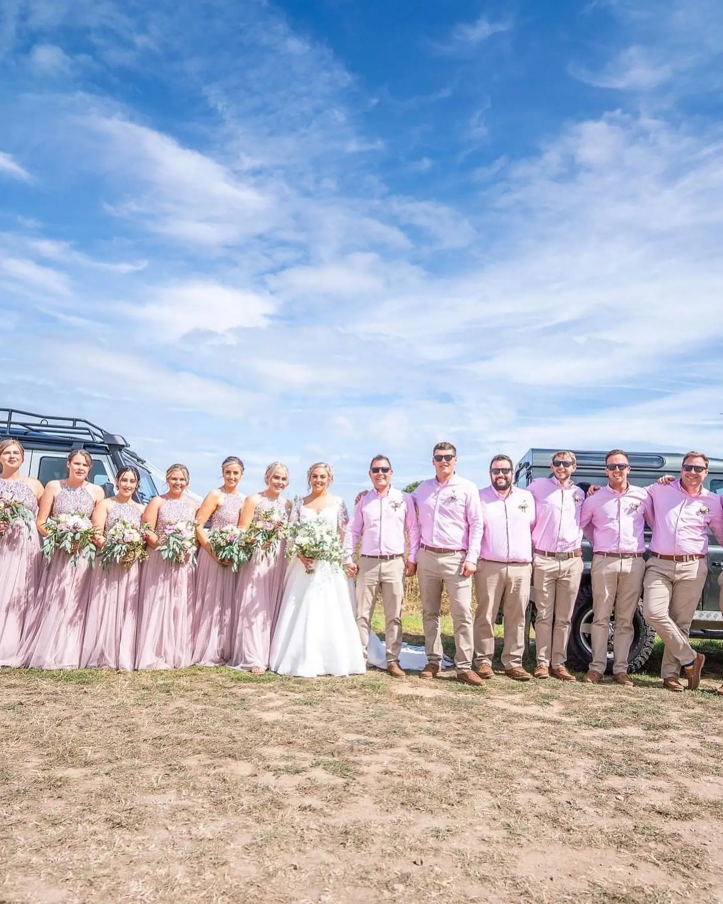 Bride In A-Line Wedding Dress Named Savannah By Maggie Sottero Bride And Groom With Bridesmaids And Groomsman