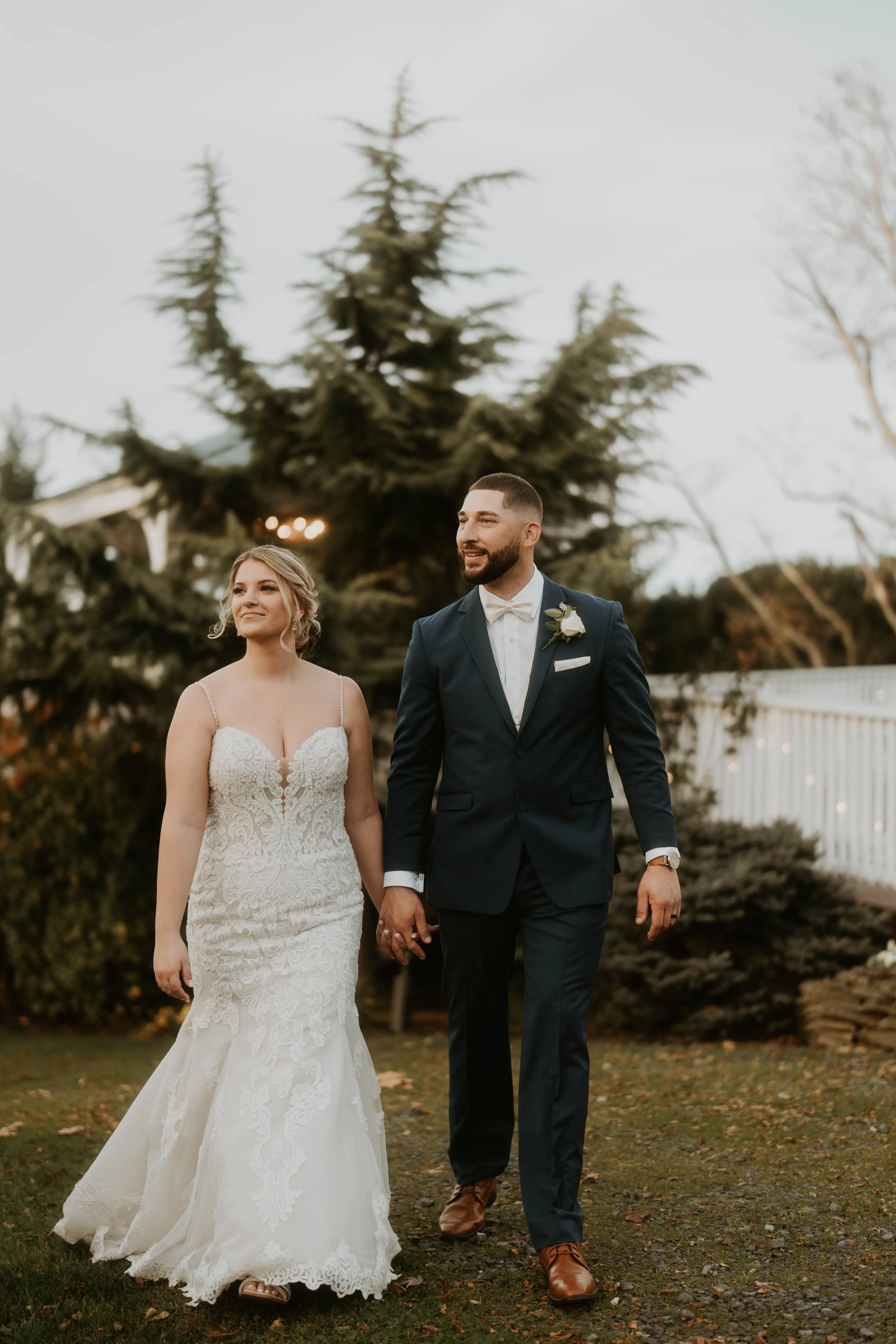 Real bride in sparkly lace fit-and-flare bridal gown called Fiona by Maggie Sottero