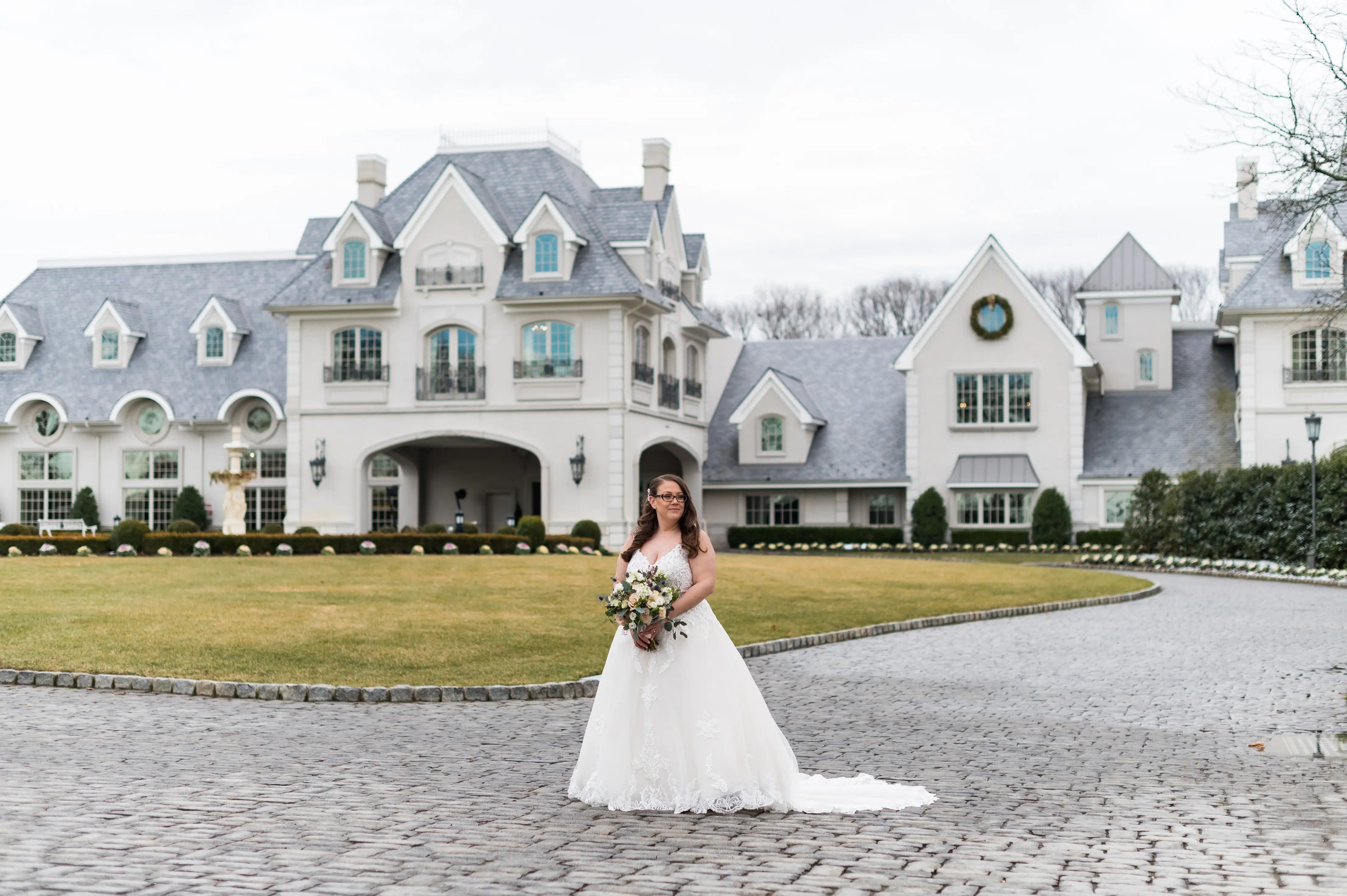 Bride in V neck ballgown called Trinity Lynette by Maggie Sottero