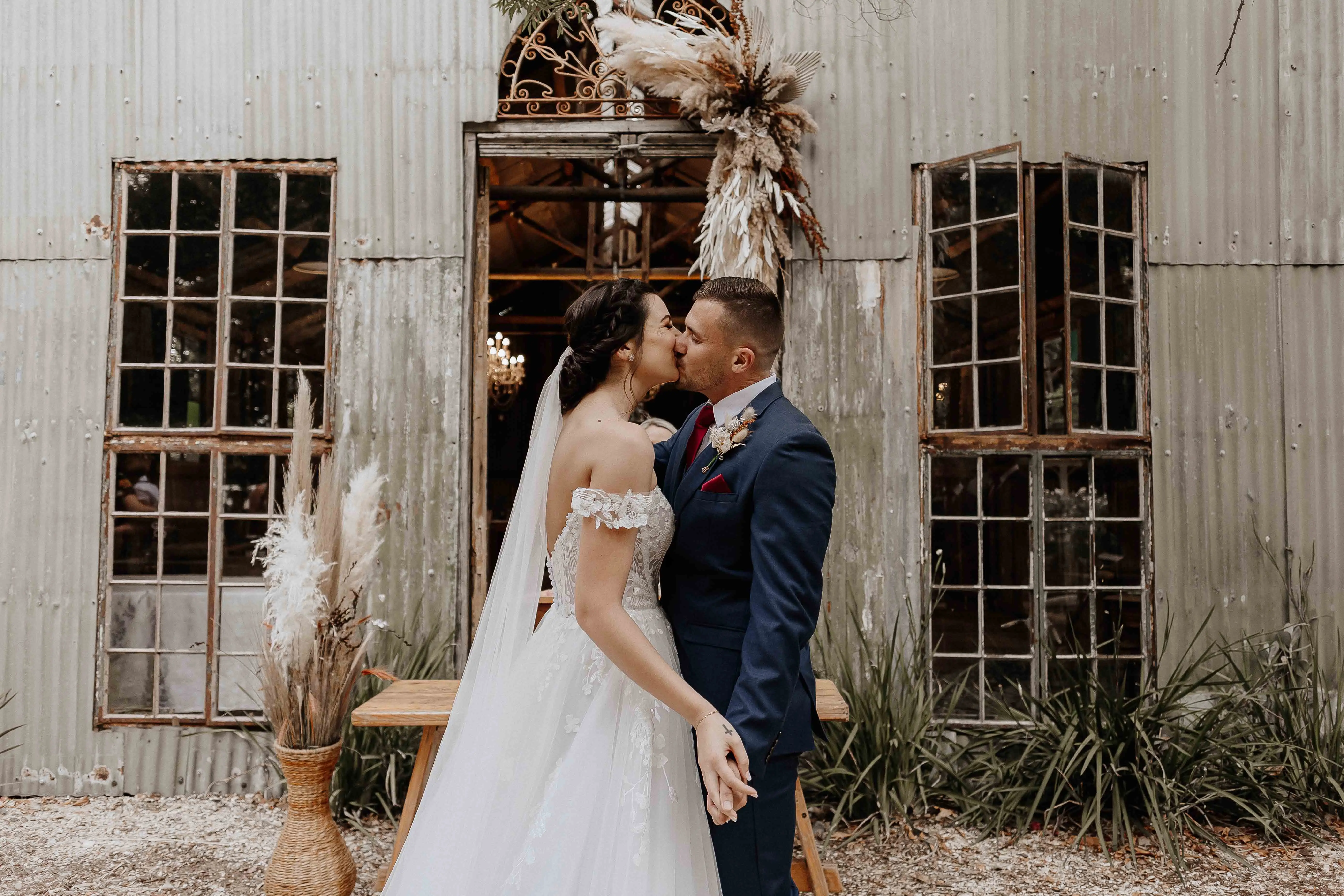 Bride In Lace Wedding Dress Called Harlem By Maggie Sottero With Groom
