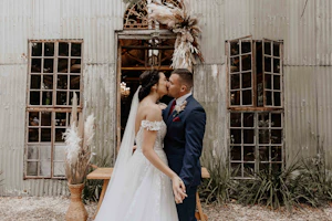 Bride In Lace Wedding Dress Called Harlem By Maggie Sottero With Groom