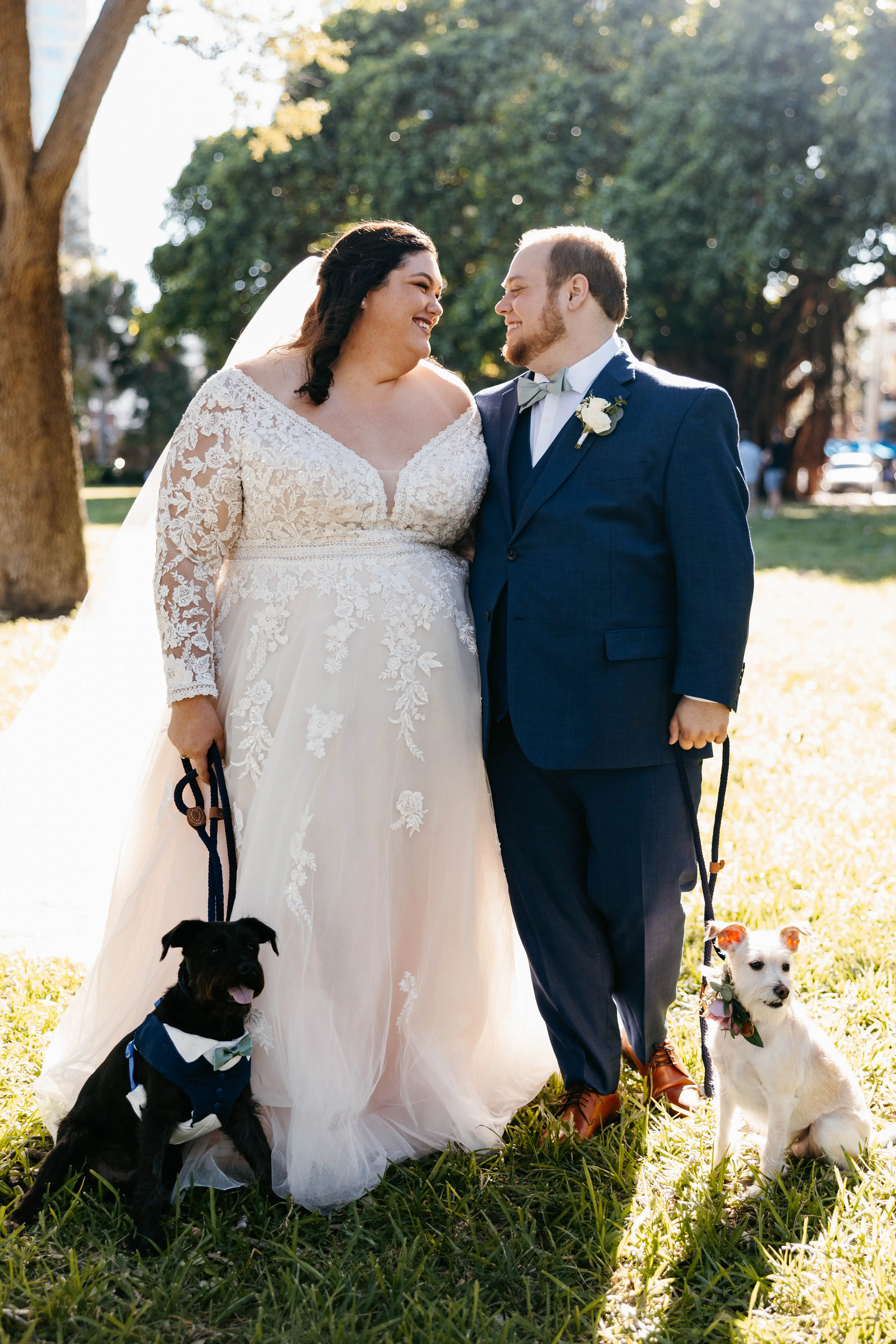 Groom With Bride Wearing Illusion Sleeve A-Line Wedding Dress Raphael By Maggie Sottero