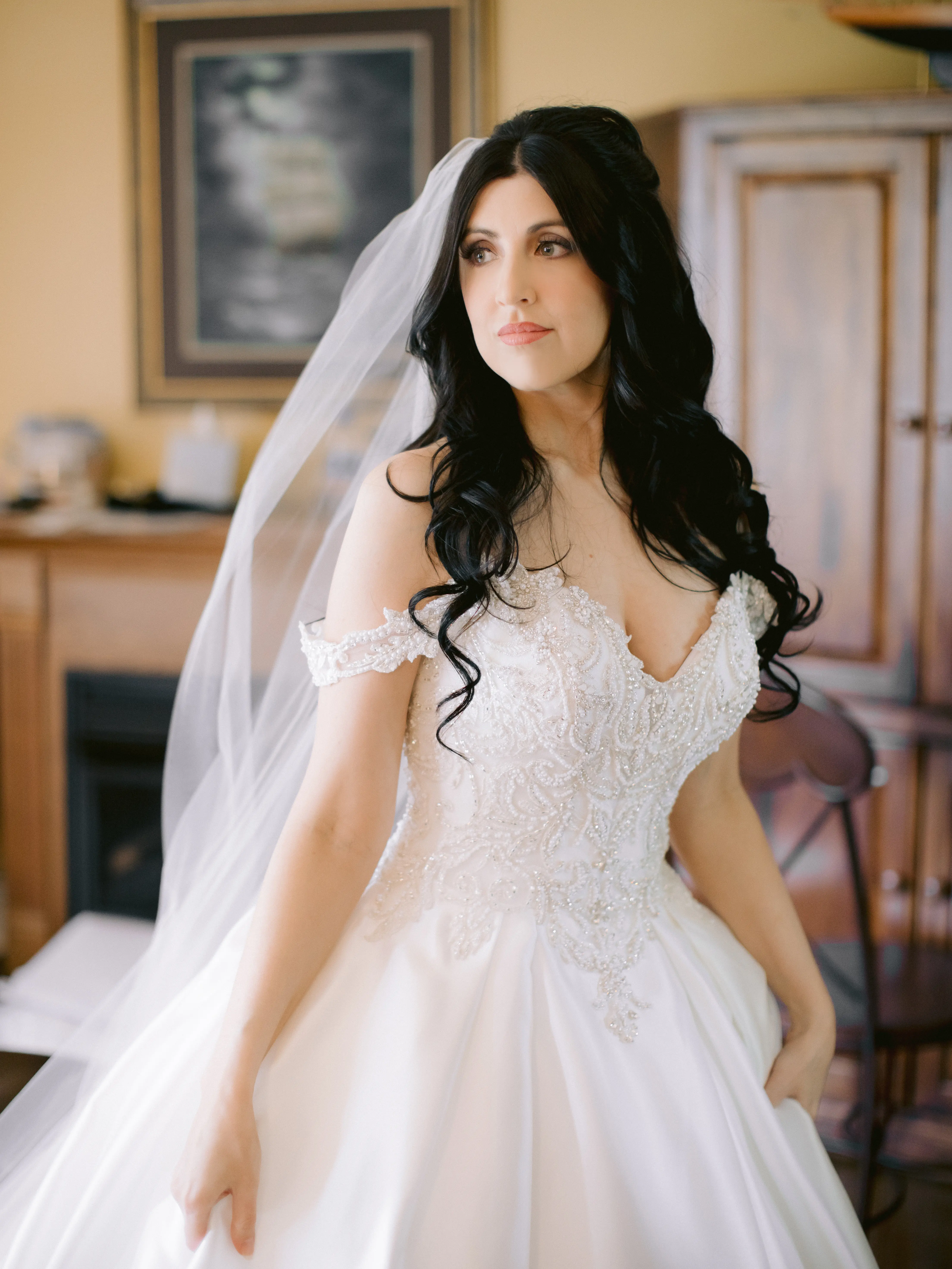 Bride wearing off the shoulder luxury ballgown wedding dress